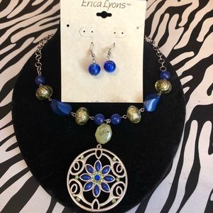 Erika Lyons earrings paired with vintage necklace